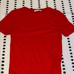 a red plain cropped shirt!